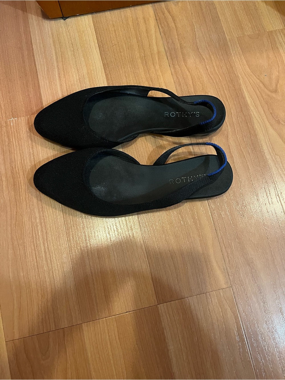 Rothy's Black Pointed Slingback Flats with Blue Accent